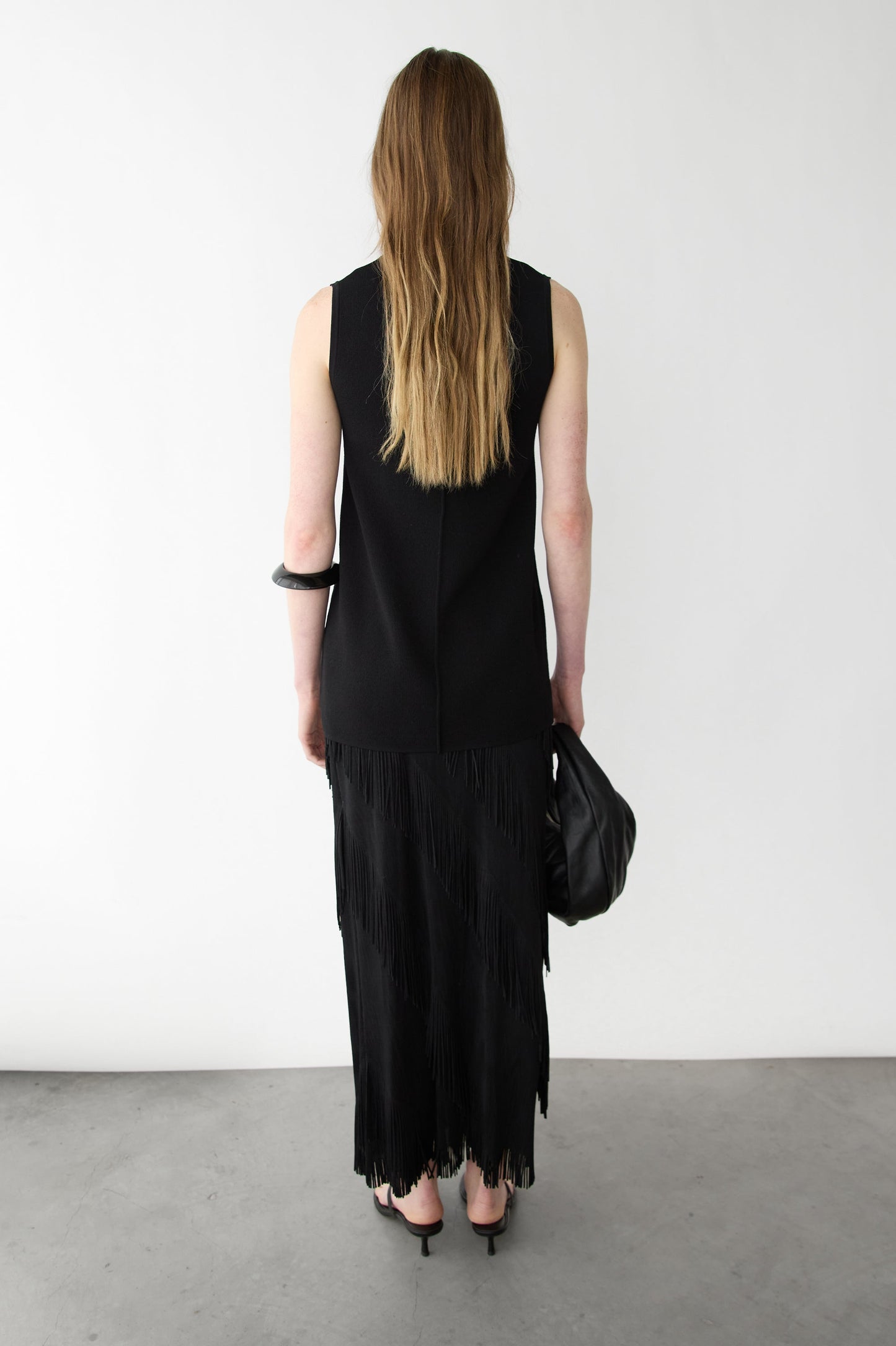 ASYMMETRICAL FRINGE SKIRT